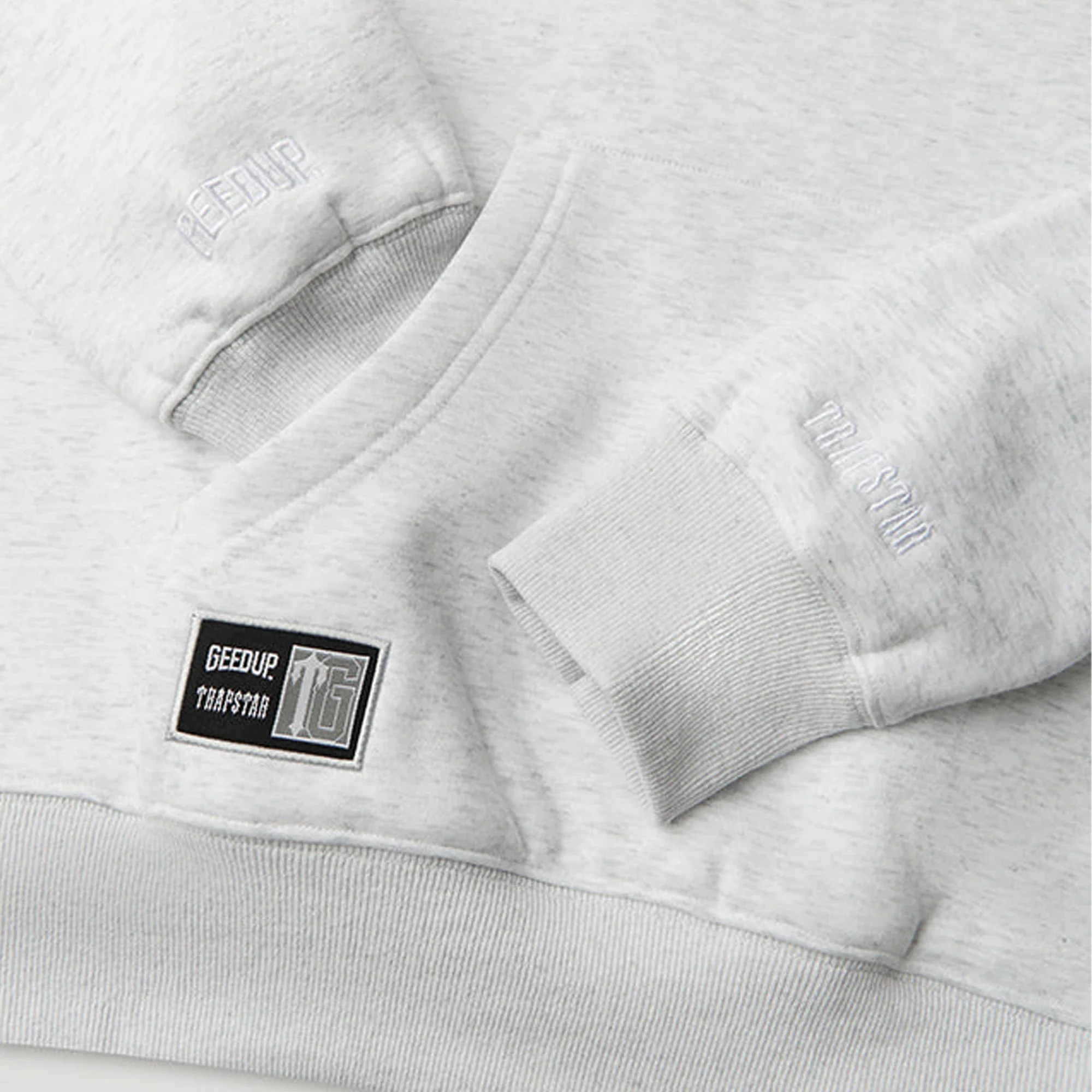 Geedup x Trapstar Sydney Shooters Hoodie 'White Marle / Blue' (2025) - Image 3